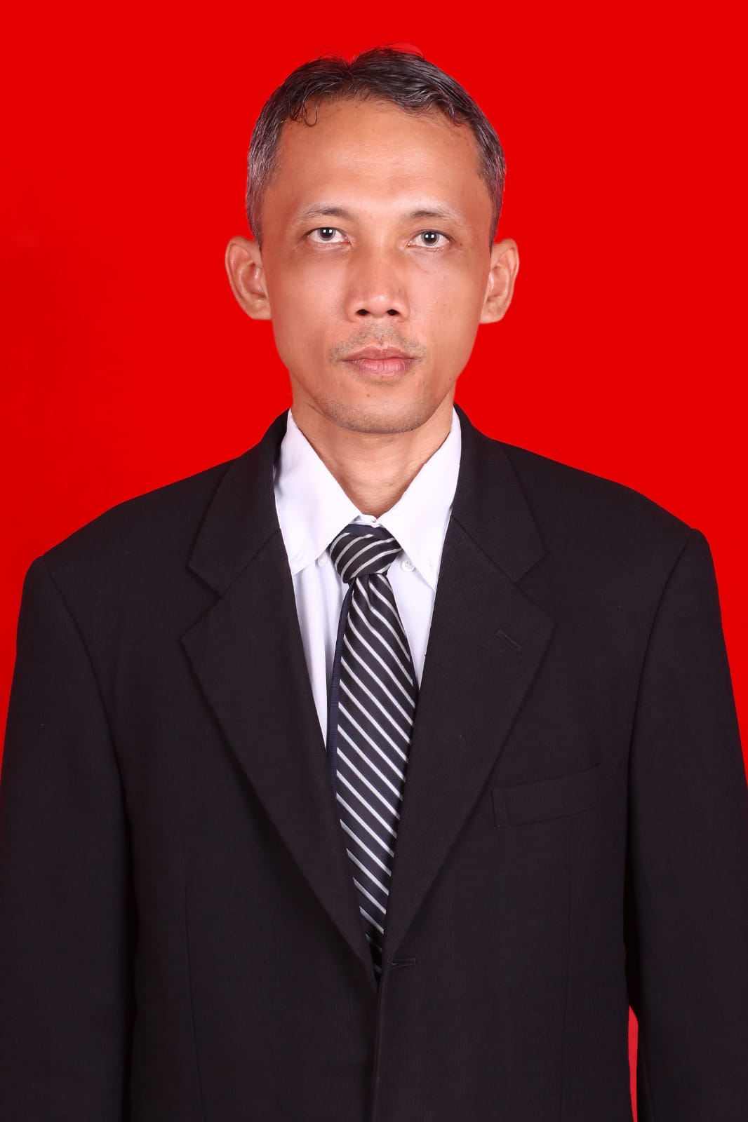 <center>Kepala Sekolah<br>ADDINUL ADLI, S. Pd. M. Pd</center>